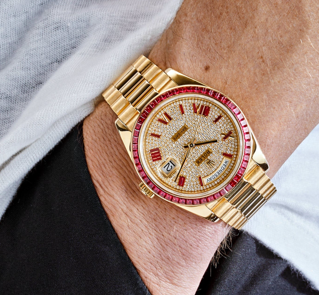 Day-date yellow gold roman dial ruby bezel 40mm