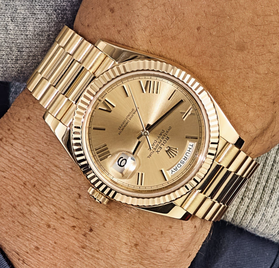 Day-date yellow gold champagne roman dial 40mm